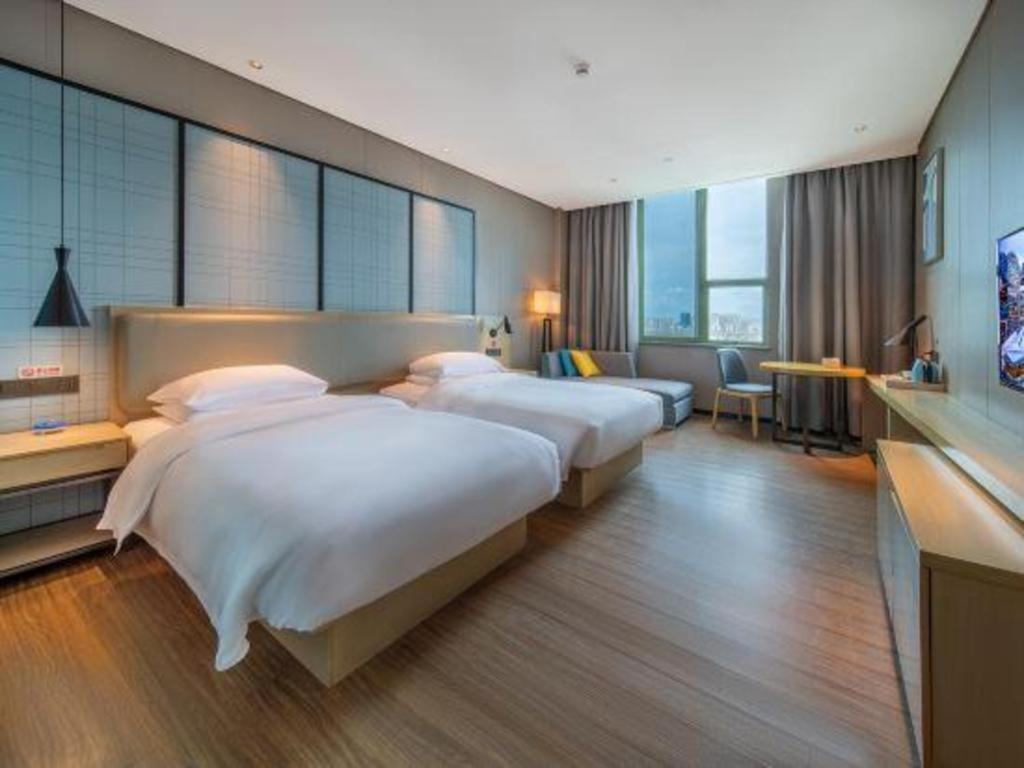 Echarm Hotel Yangjiang Baili Plaza Exterior photo