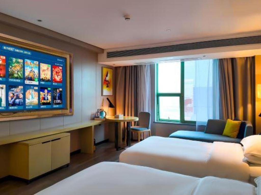 Echarm Hotel Yangjiang Baili Plaza Exterior photo