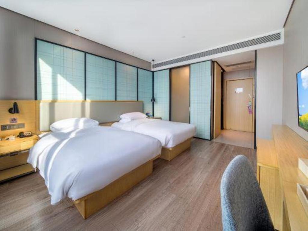 Echarm Hotel Yangjiang Baili Plaza Exterior photo