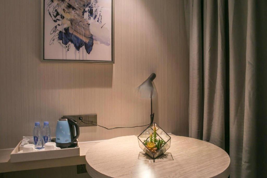 Echarm Hotel Yangjiang Baili Plaza Exterior photo