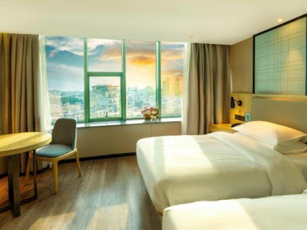 Echarm Hotel Yangjiang Baili Plaza Exterior photo