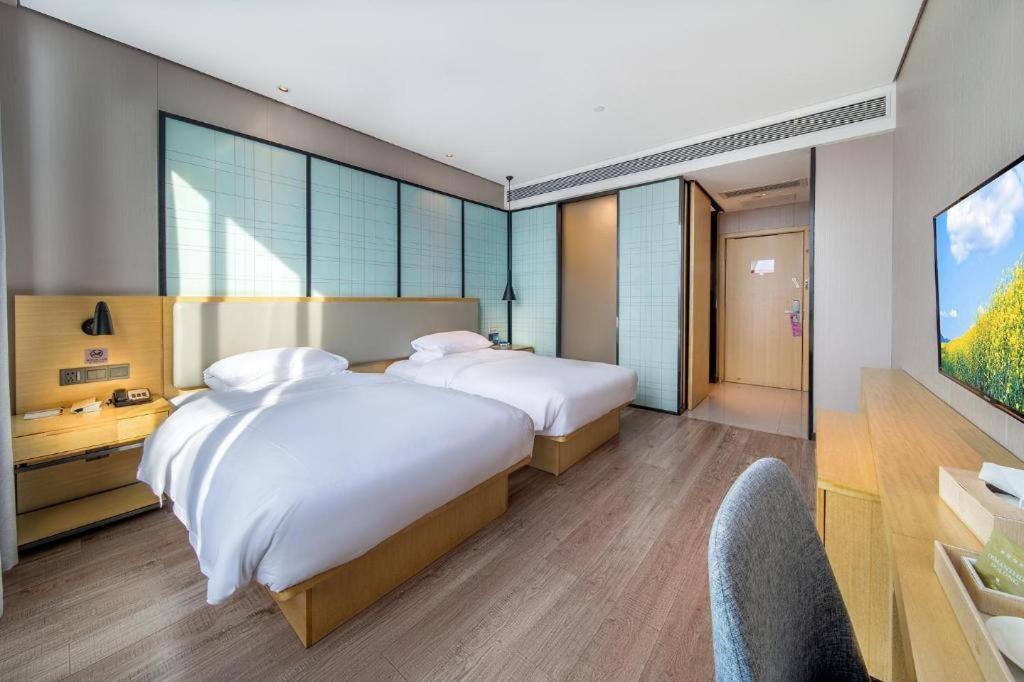 Echarm Hotel Yangjiang Baili Plaza Exterior photo