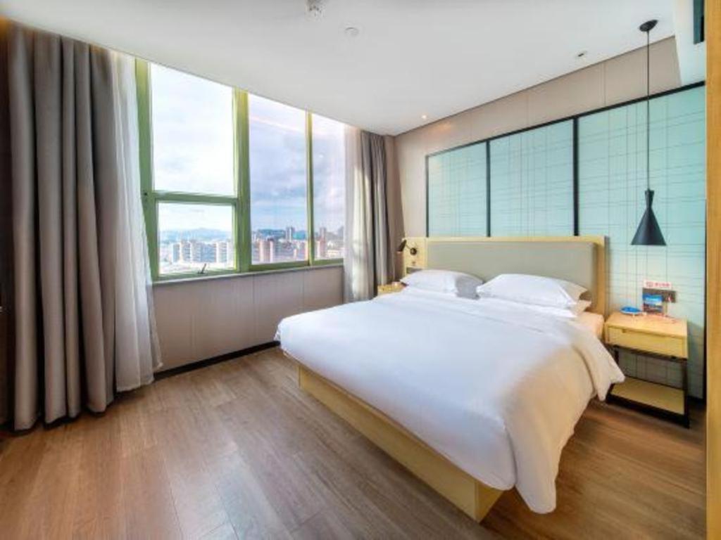 Echarm Hotel Yangjiang Baili Plaza Exterior photo