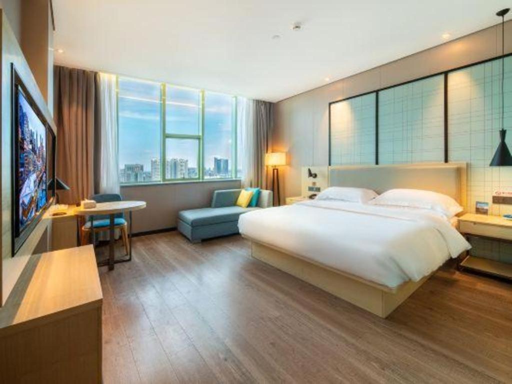 Echarm Hotel Yangjiang Baili Plaza Exterior photo