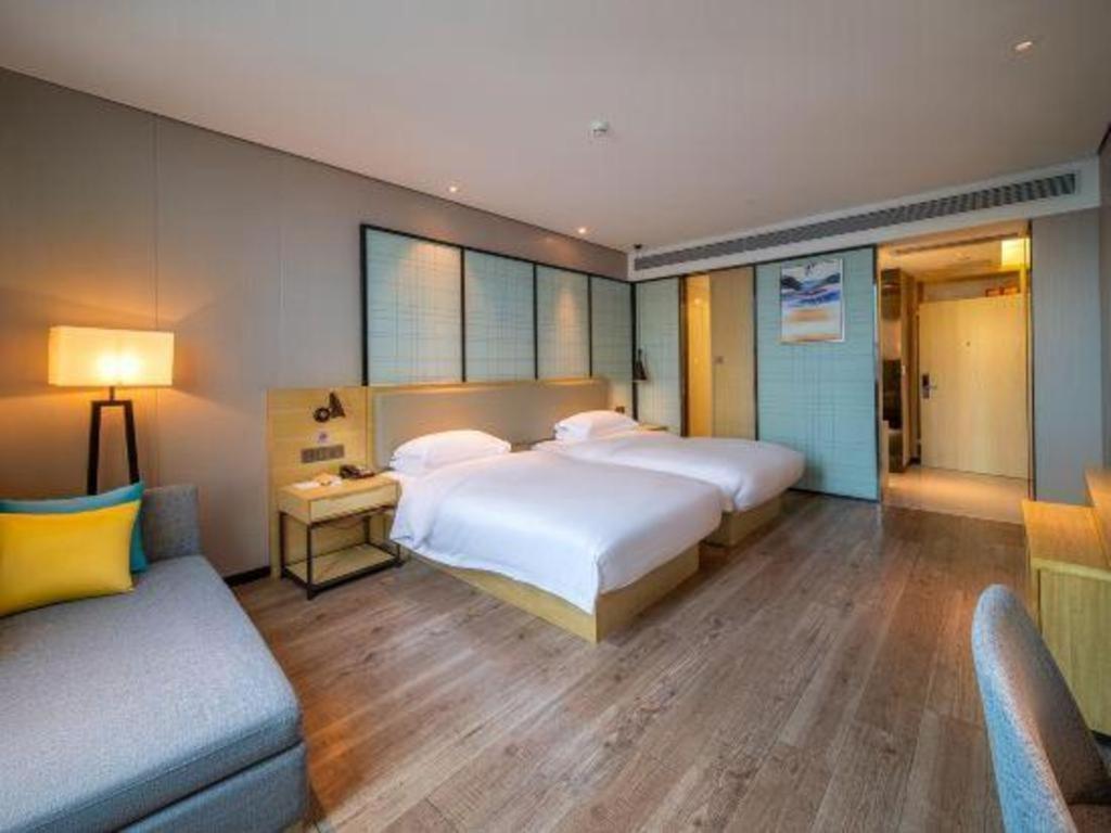Echarm Hotel Yangjiang Baili Plaza Exterior photo