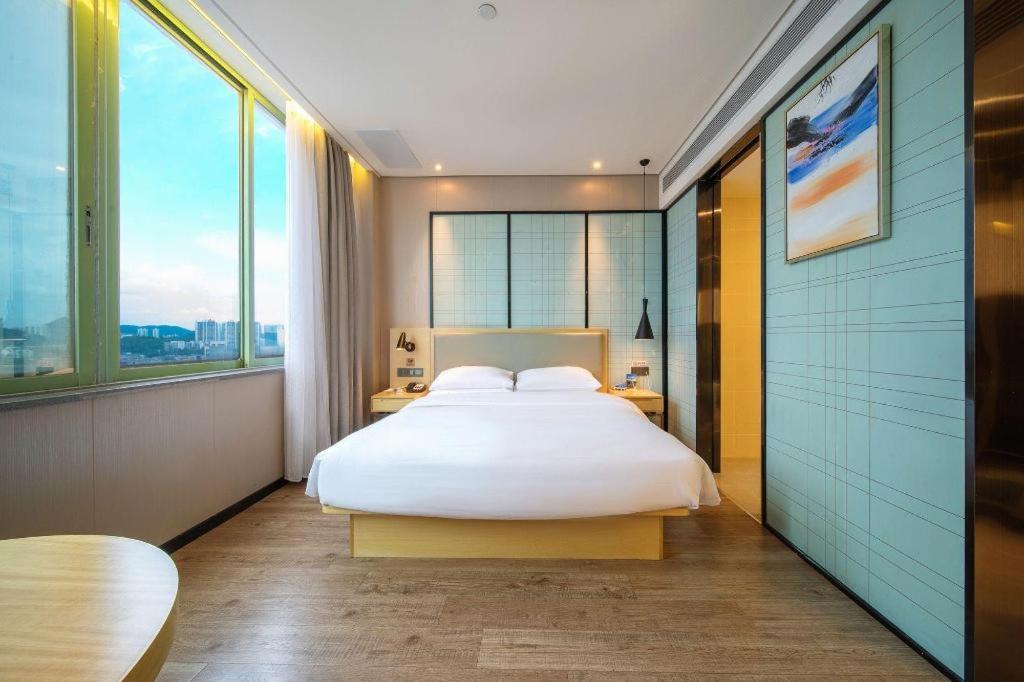 Echarm Hotel Yangjiang Baili Plaza Exterior photo